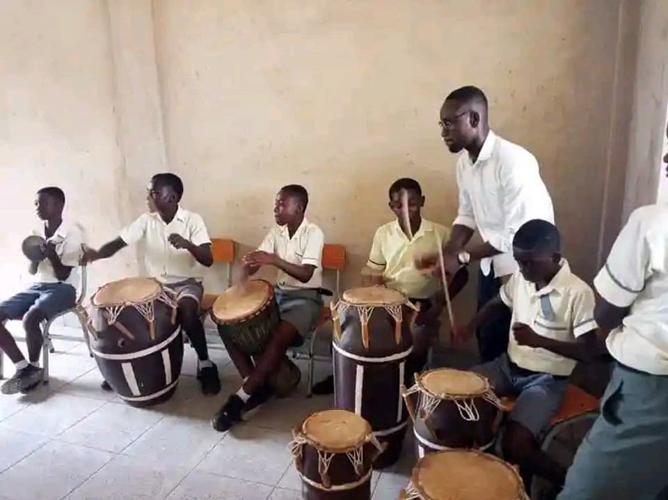 Pupils drumming in the school's cultural troupe